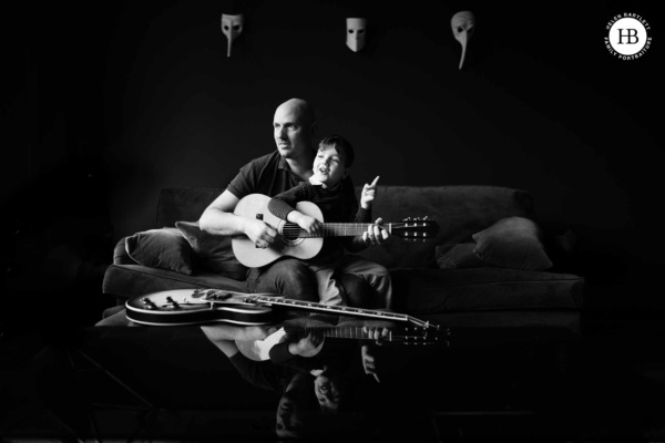 boy-plays-guitar-with-dad