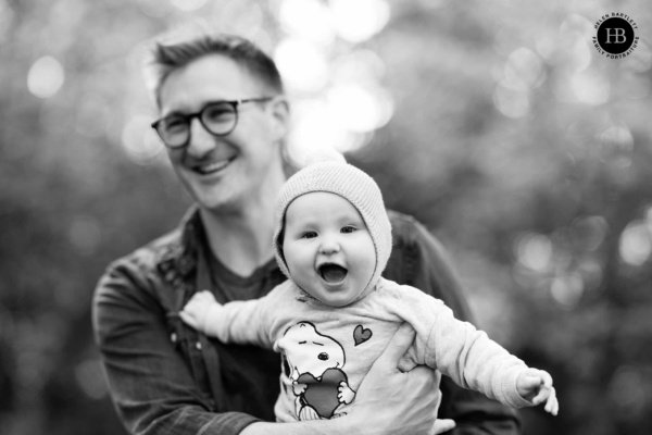 dad-holds-laughing-baby-during-professional-photo-shoot-islington