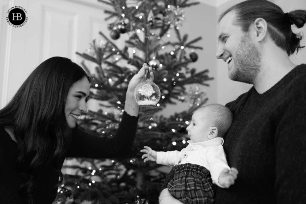 baby-looks-christmas-bauble