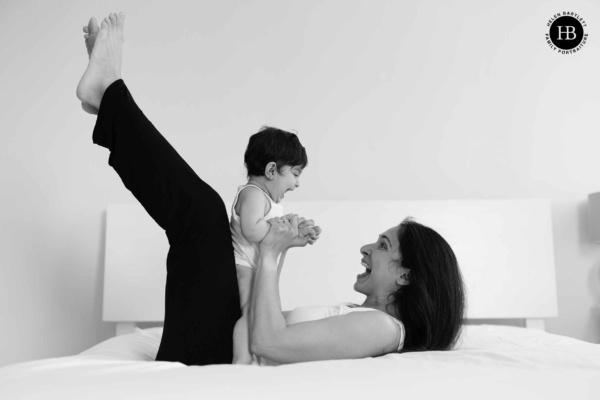 Mum and baby play together during photo shoot in paddington