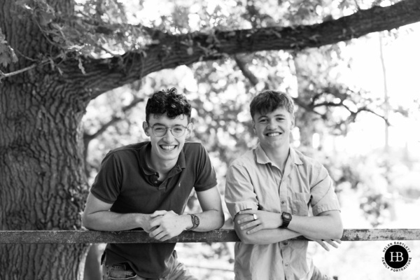 young-men-leaning-fence-nature-reserve-kent