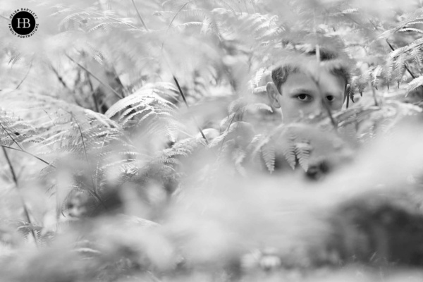 boy-hides-in-bracken-wimbledon-common-london