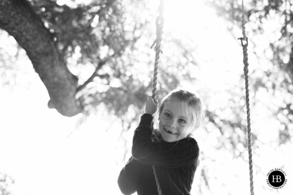 sun-filled-portrait-girl-on-rope-swing