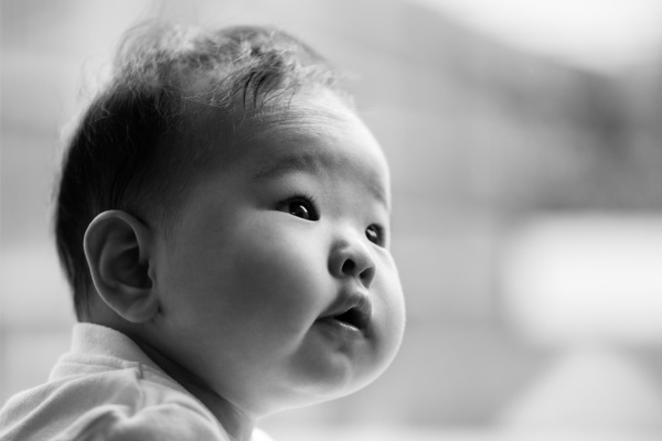 A baby's black and white portrait.