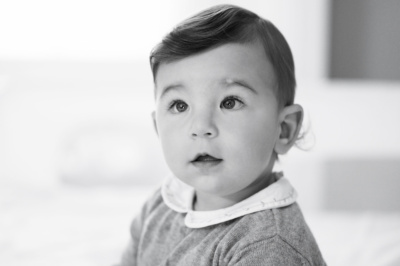 A black and white baby portrait.