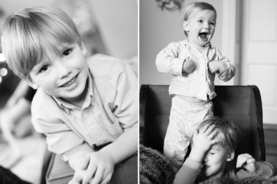 Boy smiles for black and white portraits.