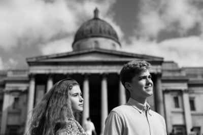 A brother and sister in Trafalgar Square outside the National Gallery.