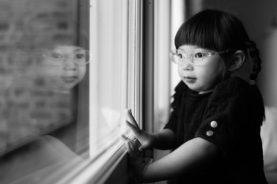 A child looks out of the window.