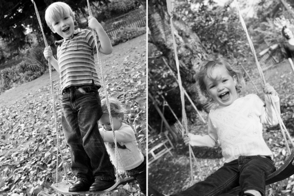 Children play on swings.