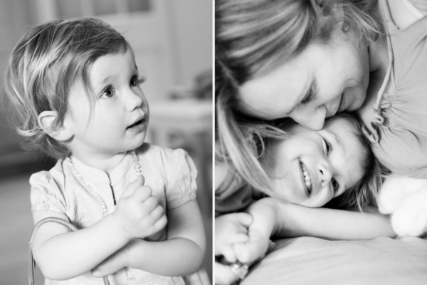 A daughter giggles with her mother in family portraits.