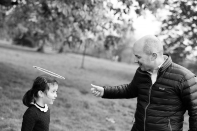 Family frisbee fun with a father and daughter.