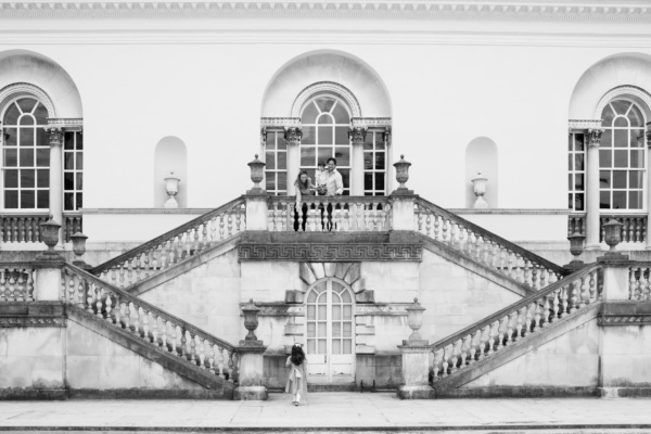 Family in front of an architectural background.