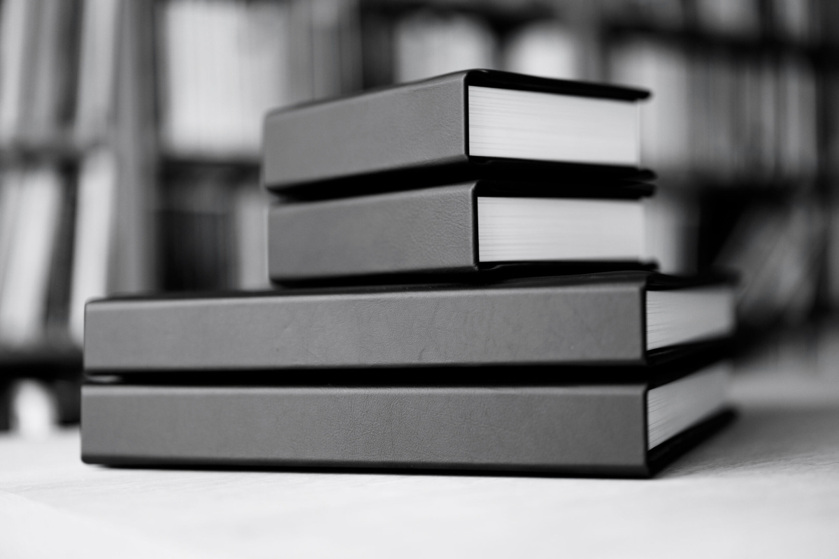 Family photo albums with black covers.