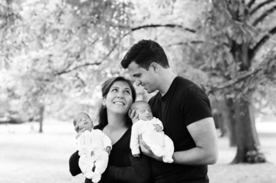 A London couple holds their newborn twins.