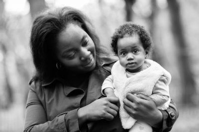 A mother and baby classic portrait in woodland.