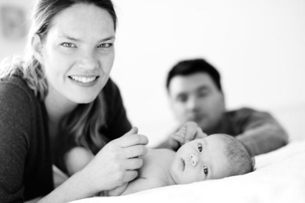 Parents welcome their newborn baby.