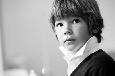 Natural light portrait of boy on vacation in London