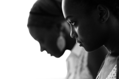 Sibling portrait with high contrast.