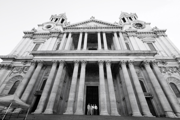 Family vacation portrait on steps of St Paul's Cathedral, London.