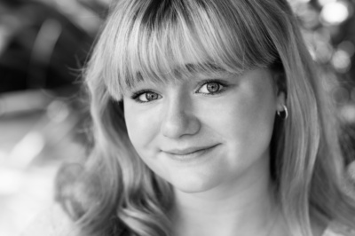 A teenage daughter portrait in black and white.