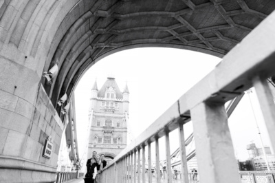 Family stand on tower bridge for family photo