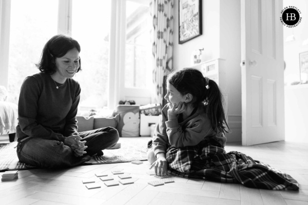 mother-and-daughter-play-cards-at-home