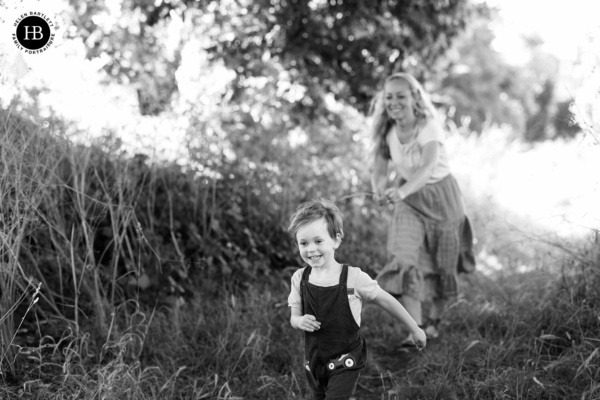 mother-son-play-in-field-long-grass