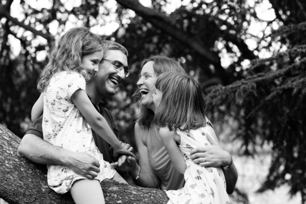 Family cuddles during children's photography in Blackheath.