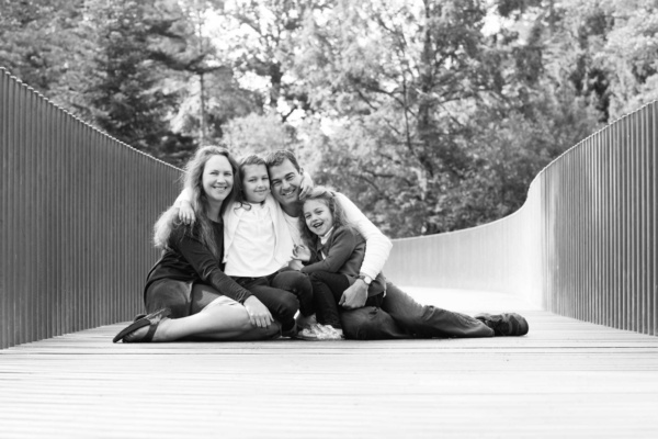 A posed family portrait of a family at Kew, TW9.