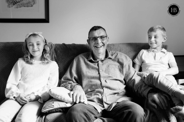 children-laughing-with-grandfather