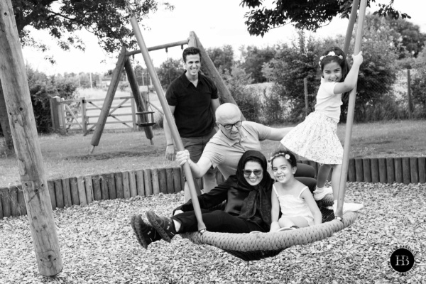 children-on-swing-with-grandparents-family-photo-shoot-west-london