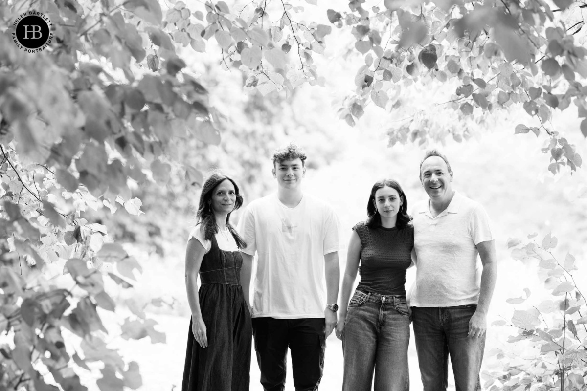 family-photo-in-sunlit-trees-london