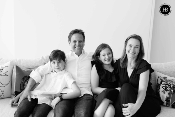 family-photo-on-sofa-black-and-white