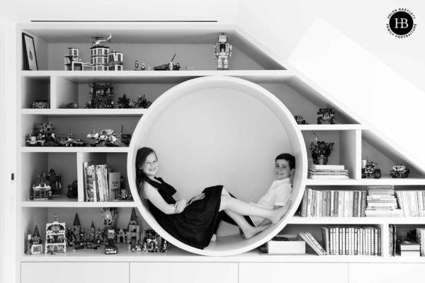 portrait-children-in-shelving-nook