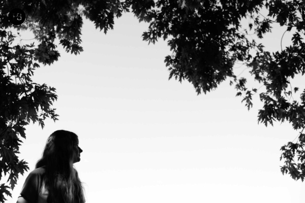 portrait-teenage-girl-with-tree-silhouette