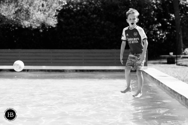 boy-jumps-into-swimming-pool