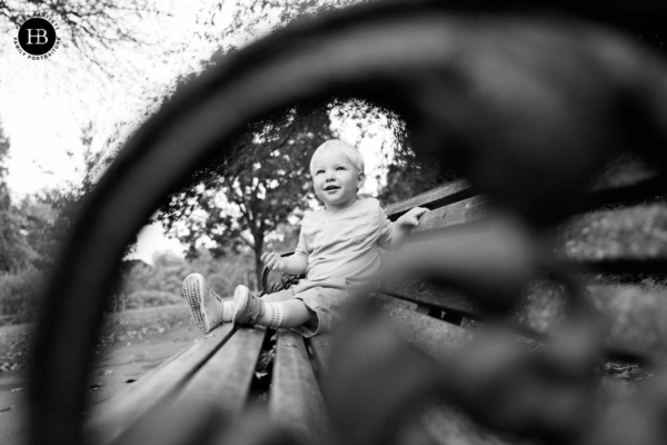 boy-sitting-on-bench-creative-family-photography