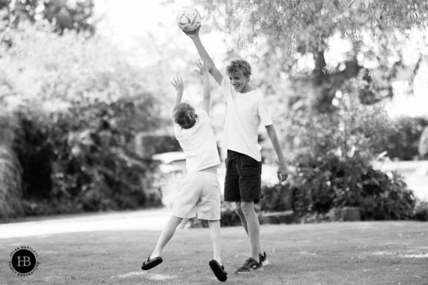 children-playing-ball-game-family-photo-shoot