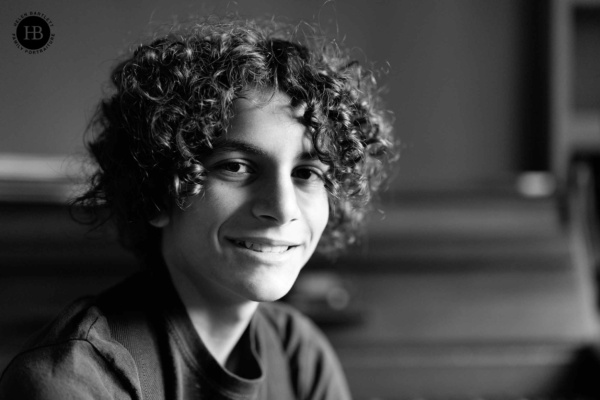 window-lit-monochrome-portrait-teenage-boy