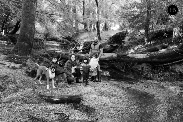 family-portrait-on-beach-by-small-river-in-new-forest