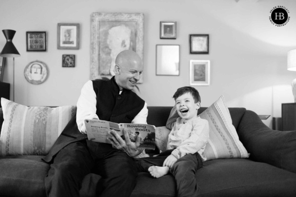 father-and-son-read-together-on-family-photography-session