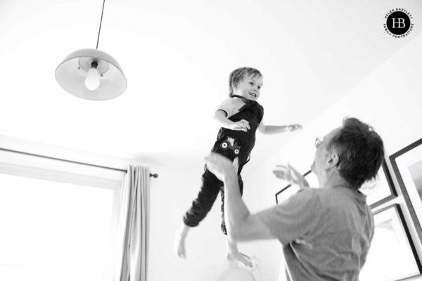 indoor-father-son-photo-throwing-in-air