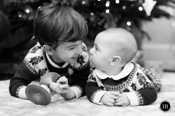 brothers-baby-look-at-each-other-in-matching-jumpers