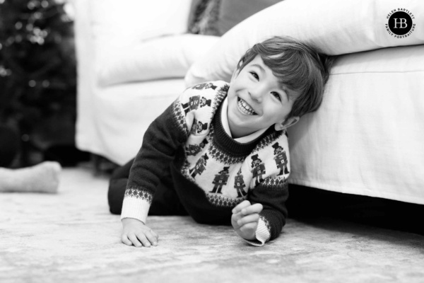 laughing-boy-plays-in-drawing-room