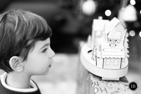 young-boy-looks-at-christmas-decoration