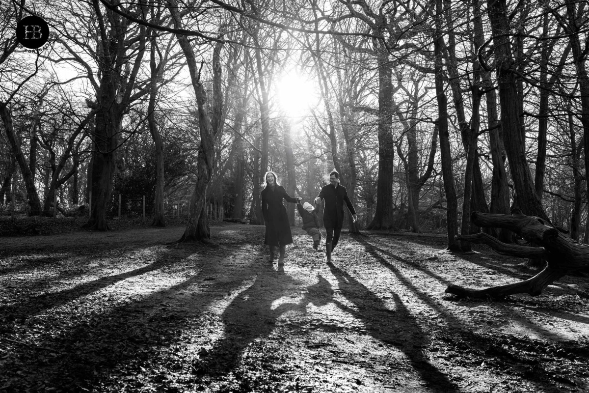 family-photo-in-low-winter-light-highgate-wood-london