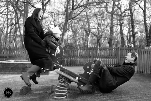 happy-family-photo-on-see-saw