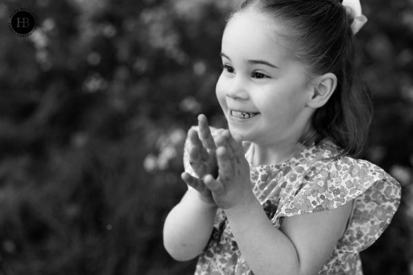 laughing-little-girl-claps-hands