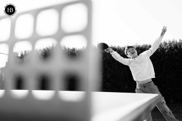 little-boy-jumps-for-joy-playing-table-tennis-clapham-sw4