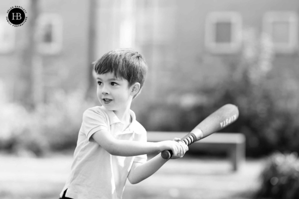 little-boy-plays-baseball-on-family-photo-shoot-in-borough